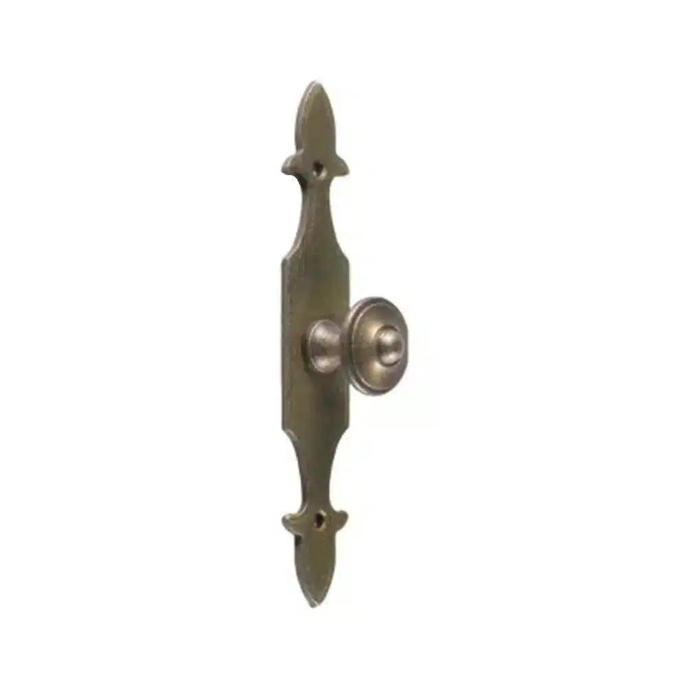 brass antique knob on plate