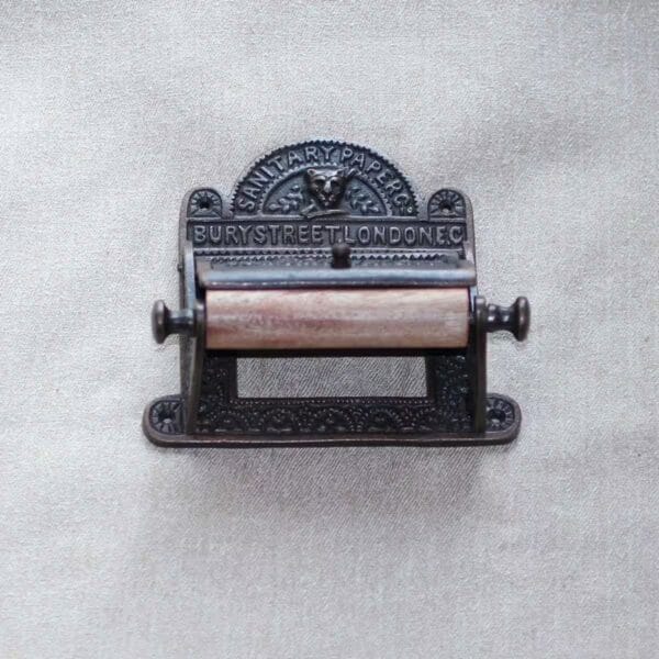 Antique toilet paper holder